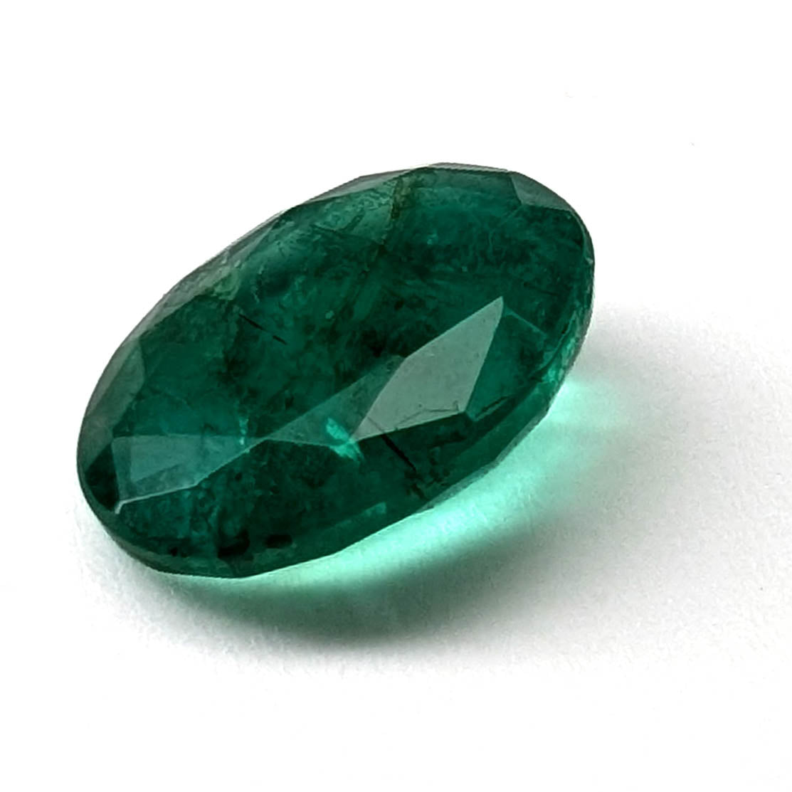 Emerald faceted oval cut gemstone, 3.15ct, alternate angle, view 3 of 13