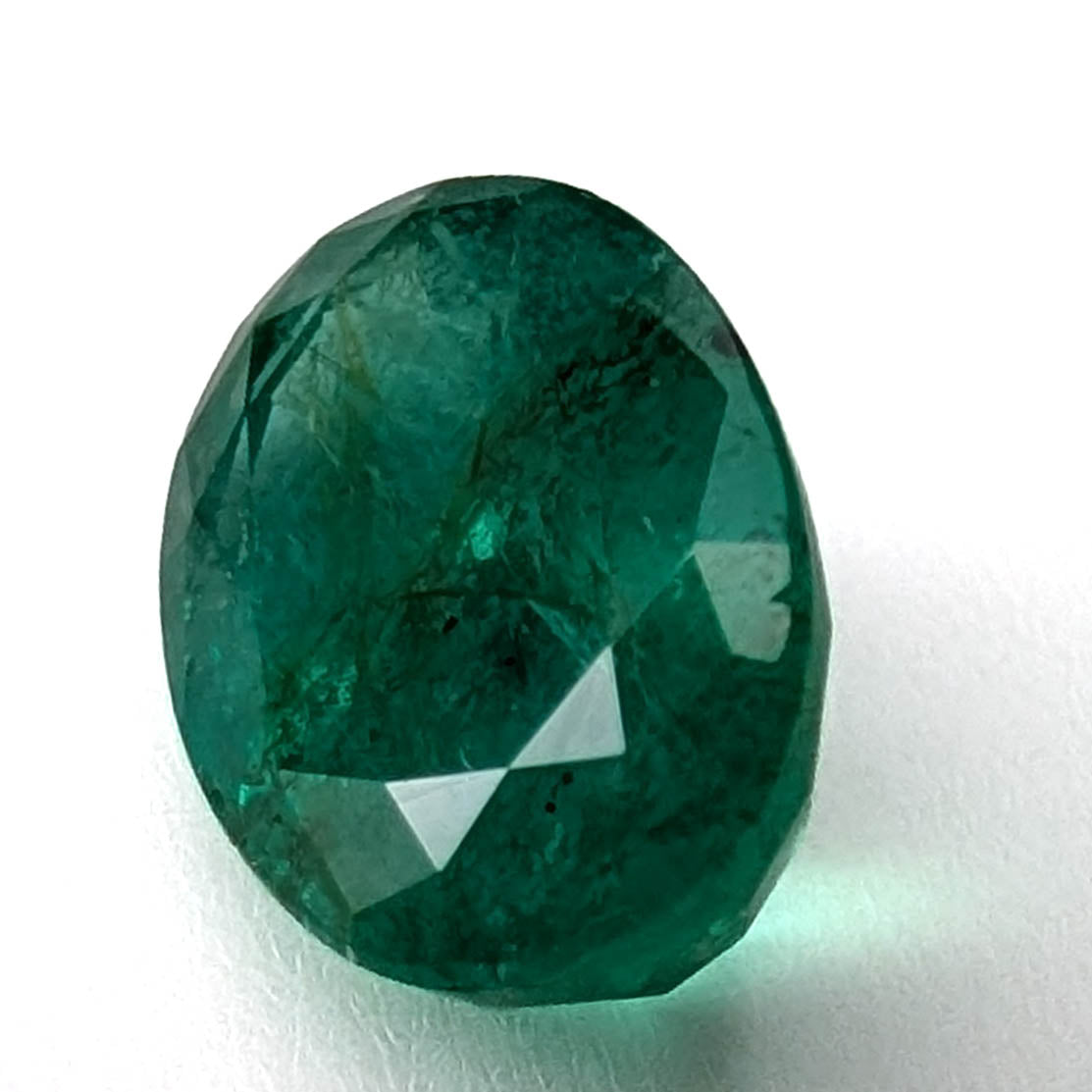 Emerald faceted oval cut gemstone, 3.22ct, alternate angle, view 4 of 12