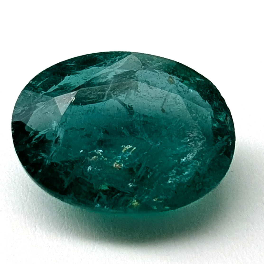 Emerald faceted oval cut gemstone, 3.55ct, main view, view 1 of 9