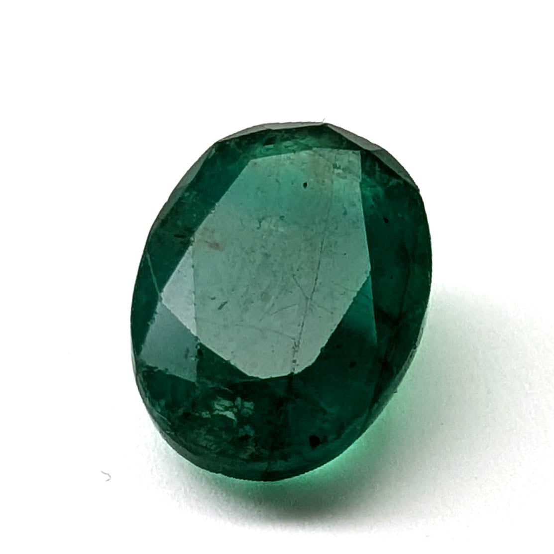 Emerald faceted oval cut gemstone, 3.84ct, main view, view 1 of 9