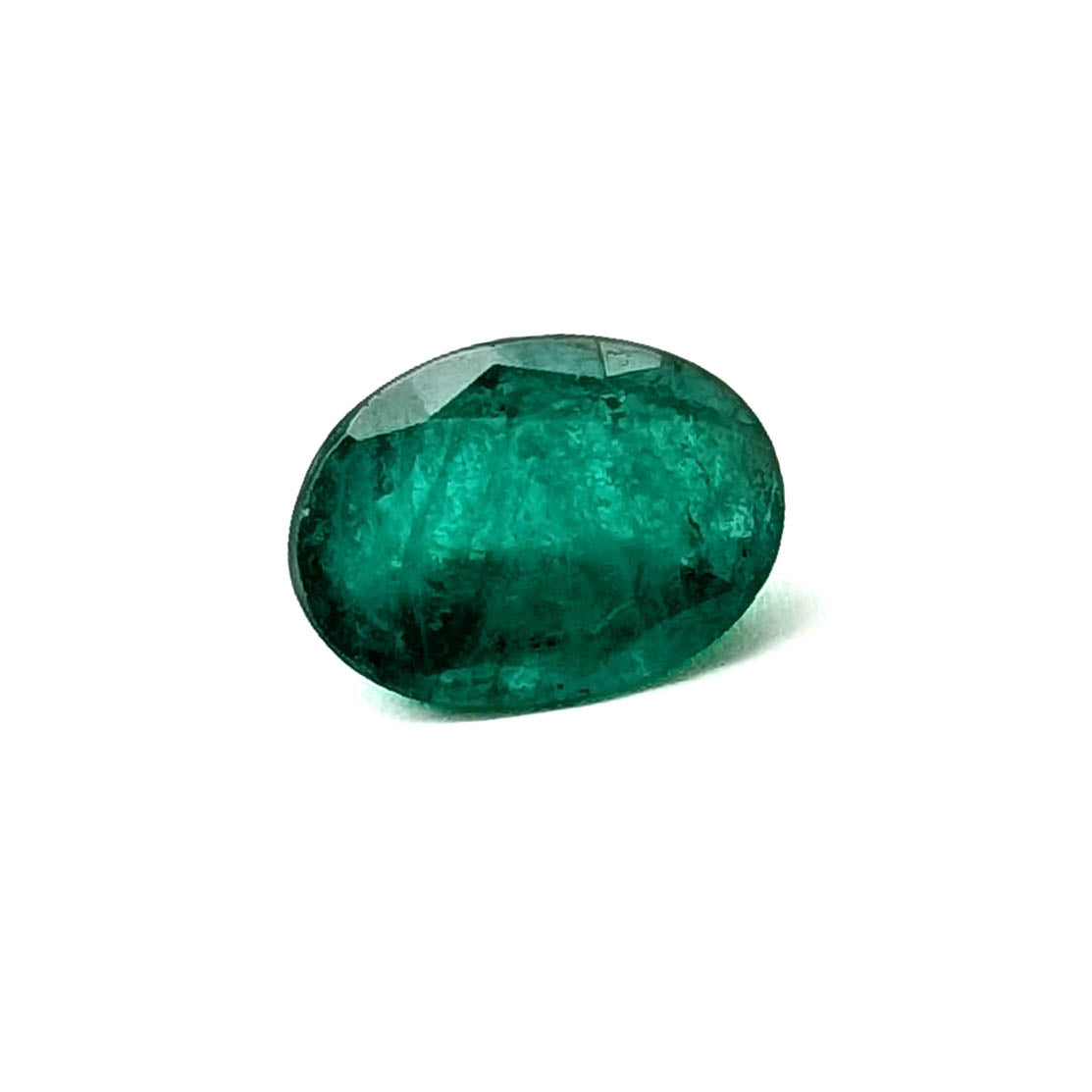 Emerald faceted oval gemstone, 1.92ct, face-up view from a distance, view 10 of 12
