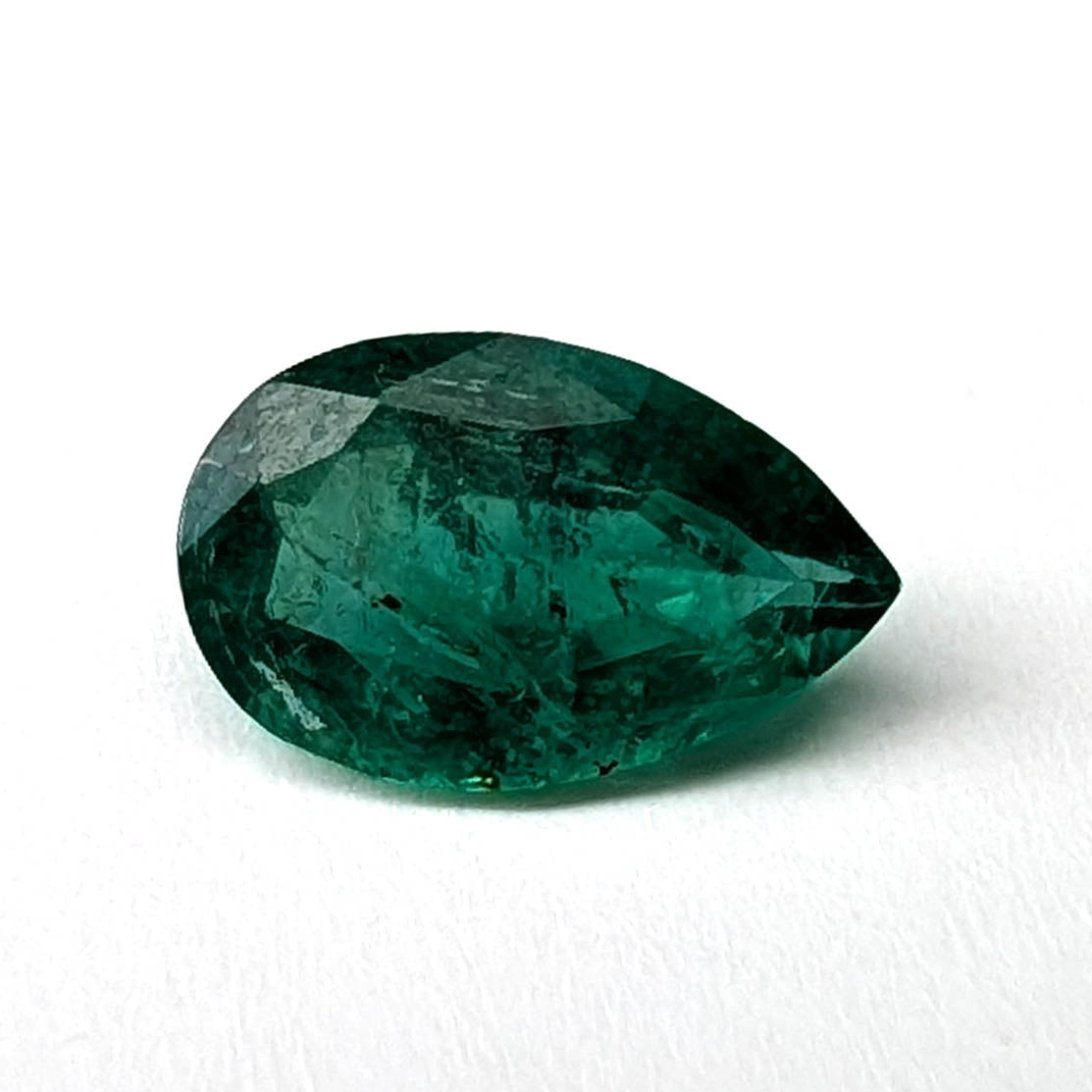 Emerald faceted pear cut gemstone, 0.94ct, main view, view 1 of 10