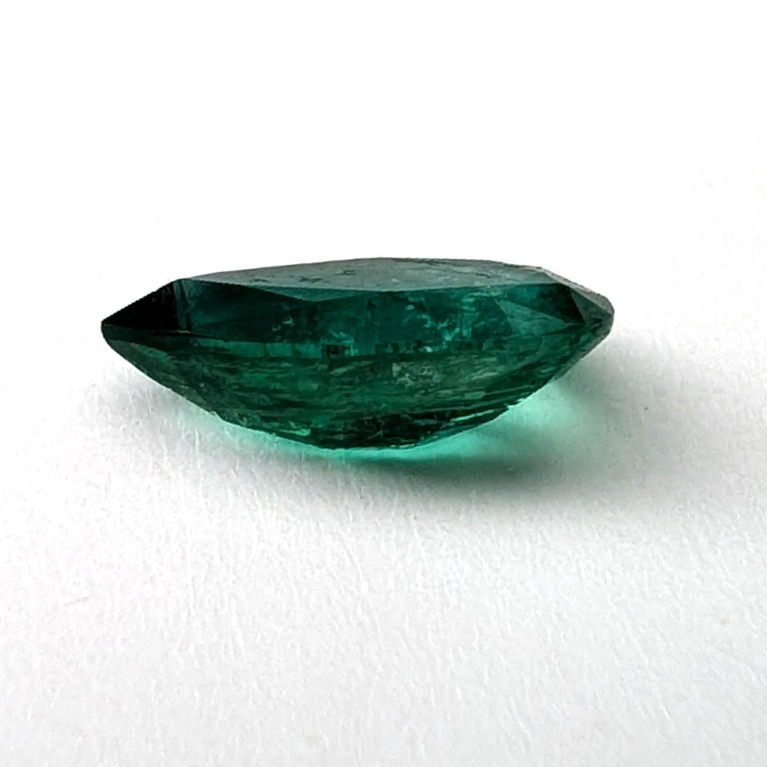 Emerald faceted pear cut gemstone, 0.94ct, alternate angle, view 7 of 10