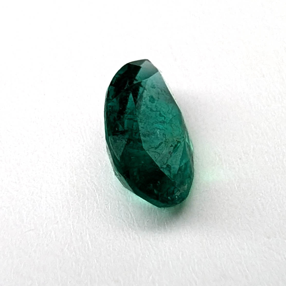Emerald faceted pear cut gemstone, 0.94ct, alternate angle, view 8 of 10