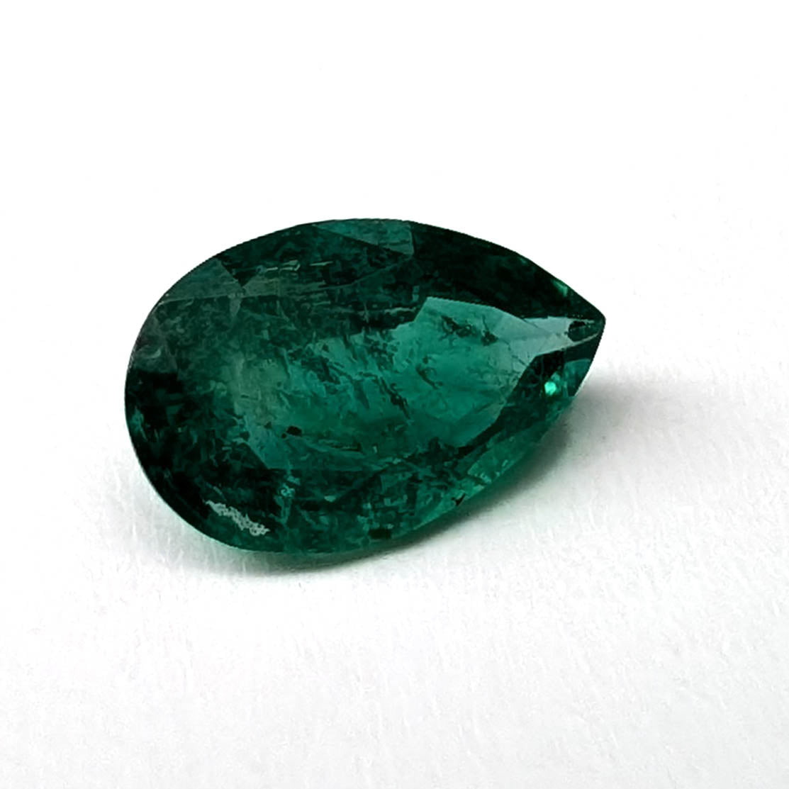 Emerald faceted pear cut gemstone, 0.94ct, alternate angle, view 9 of 10