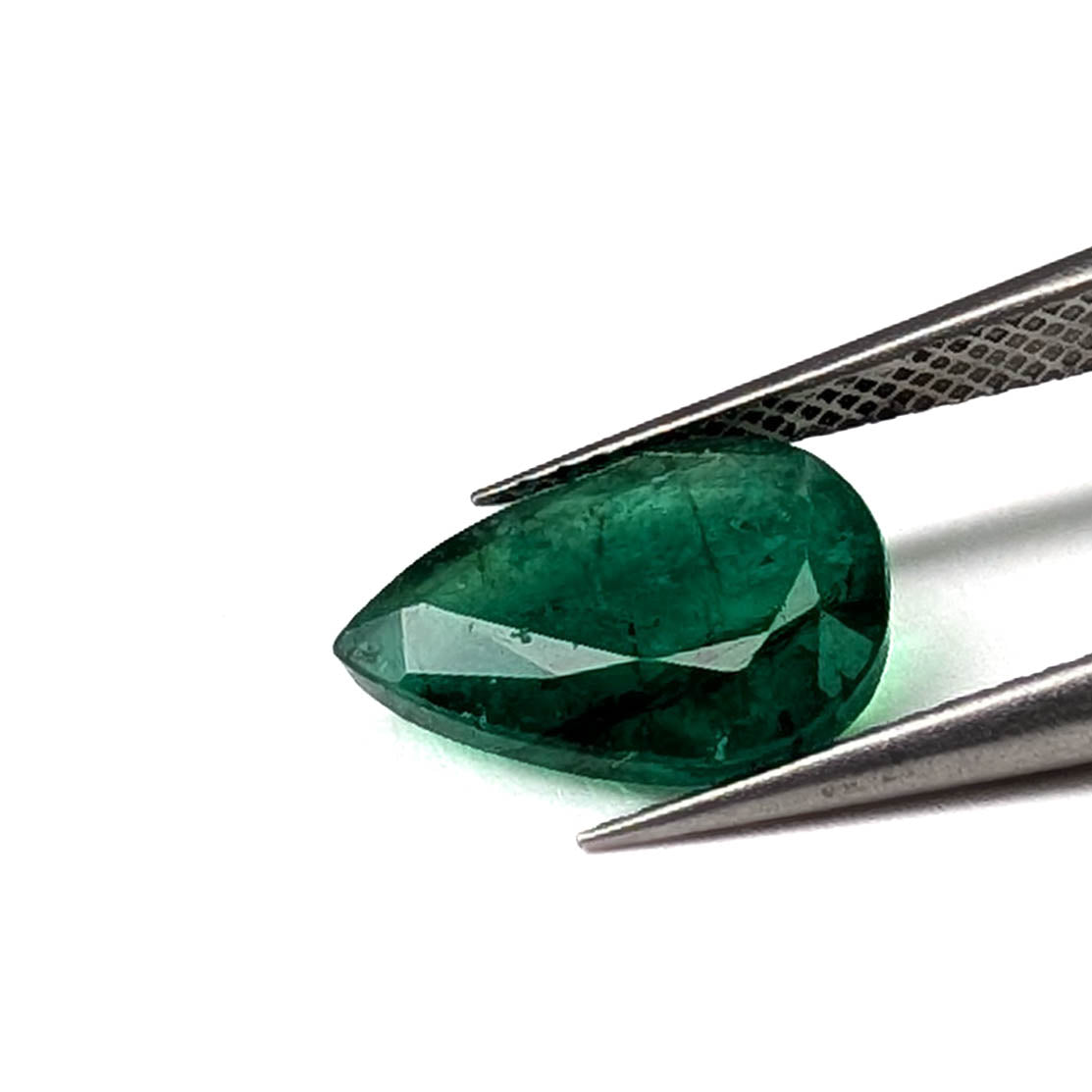 Emerald faceted pear cut gemstone, 2.80ct, held in tweezers, view 12 of 13