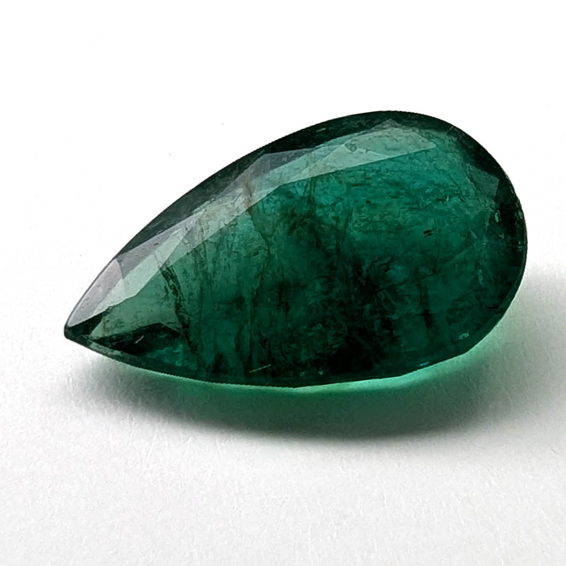 Emerald faceted pear cut gemstone, 3.95ct, main view, view 1 of 13