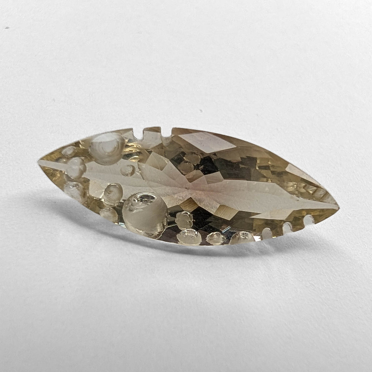 Oregon sunstone faceted marquise fantasy cut gemstone, 6.42ct, view 1 of 9