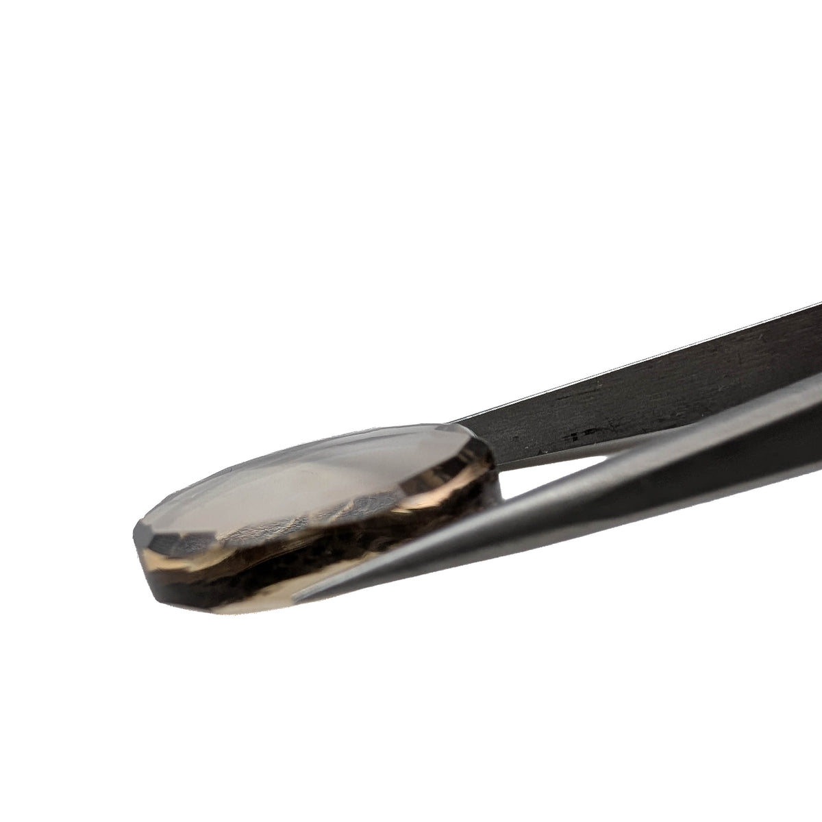 Smoky Quartz faceted round brilliant flatback gemstone, 21.80ct, from Minas Gerais, Brazil, held in tweezers, view 6 of 6