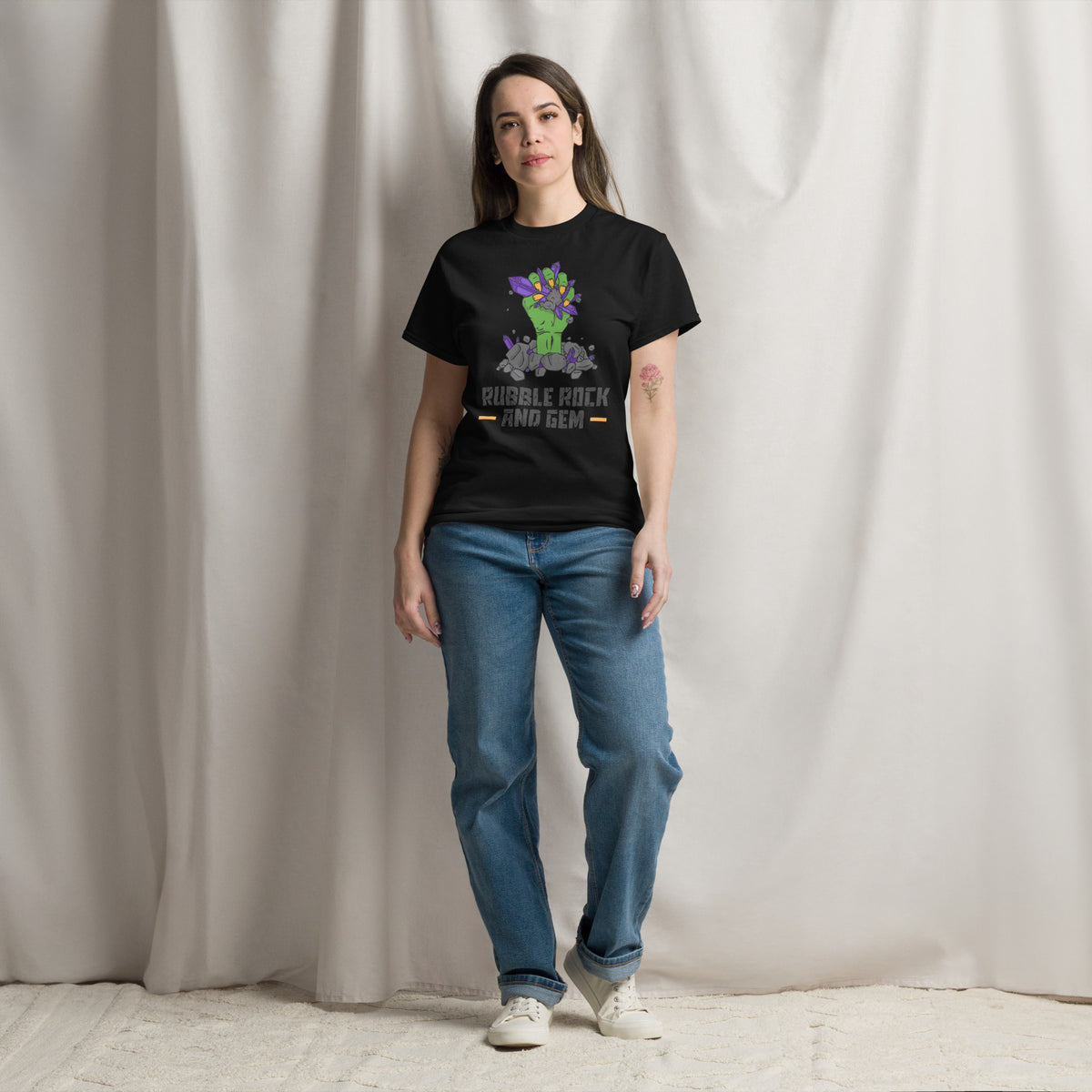 Rubble Rock and Gem classic logo tee – worn by woman, standing