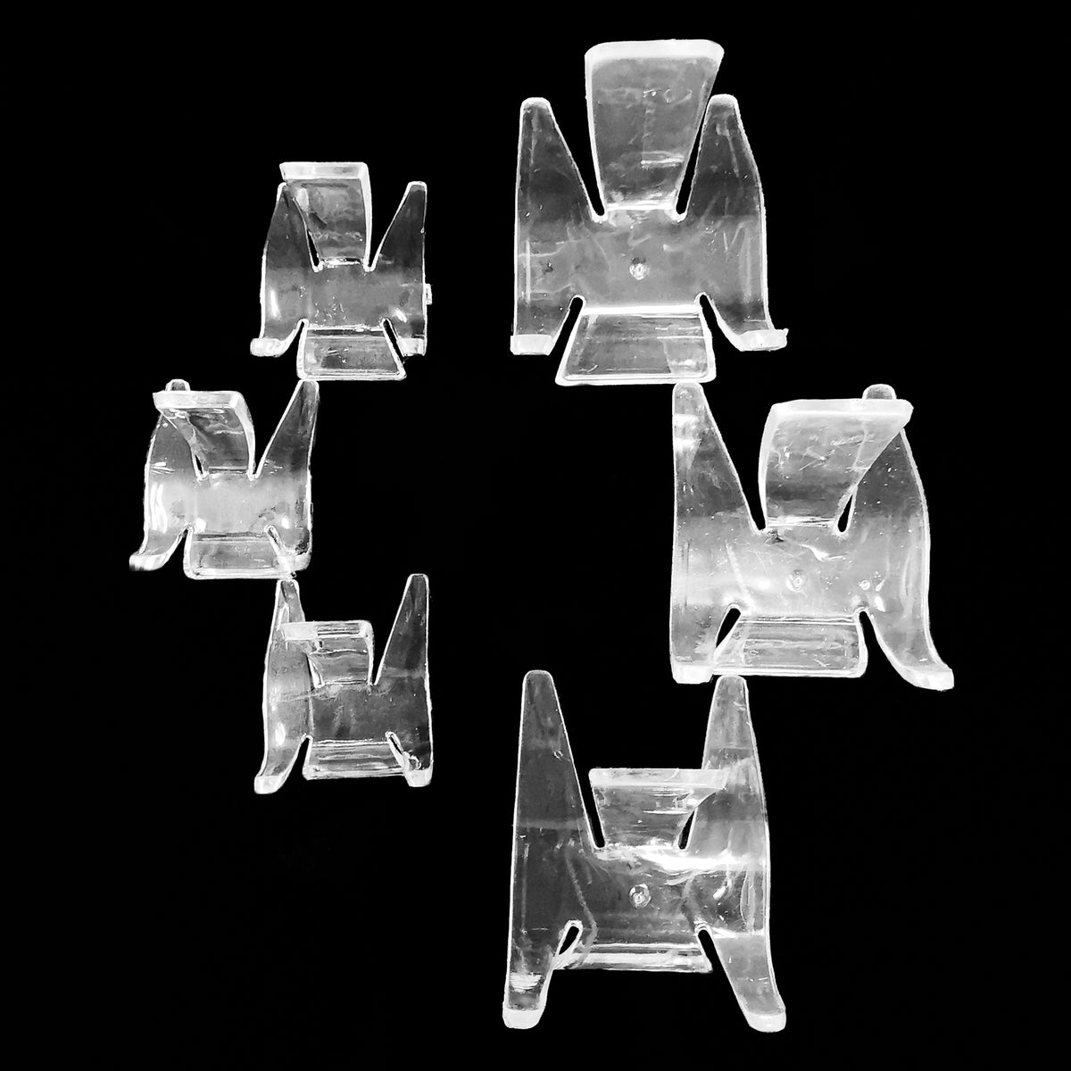 Acrylic Swoop display stand.