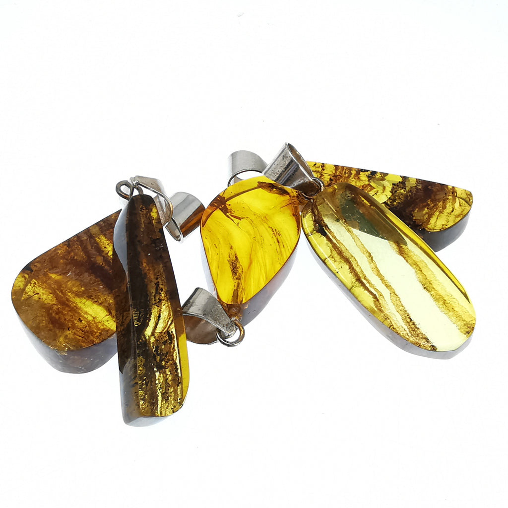 Amber pendant in silver-plated base metal.