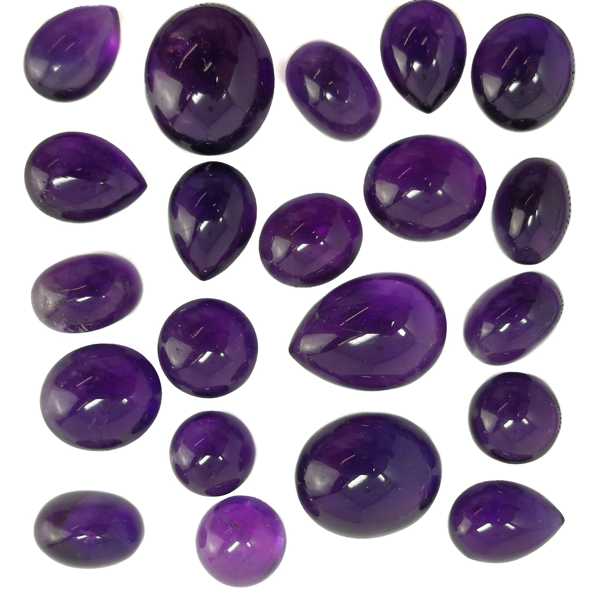 Amethyst cabochon, a variety of quartz, from Brazil.