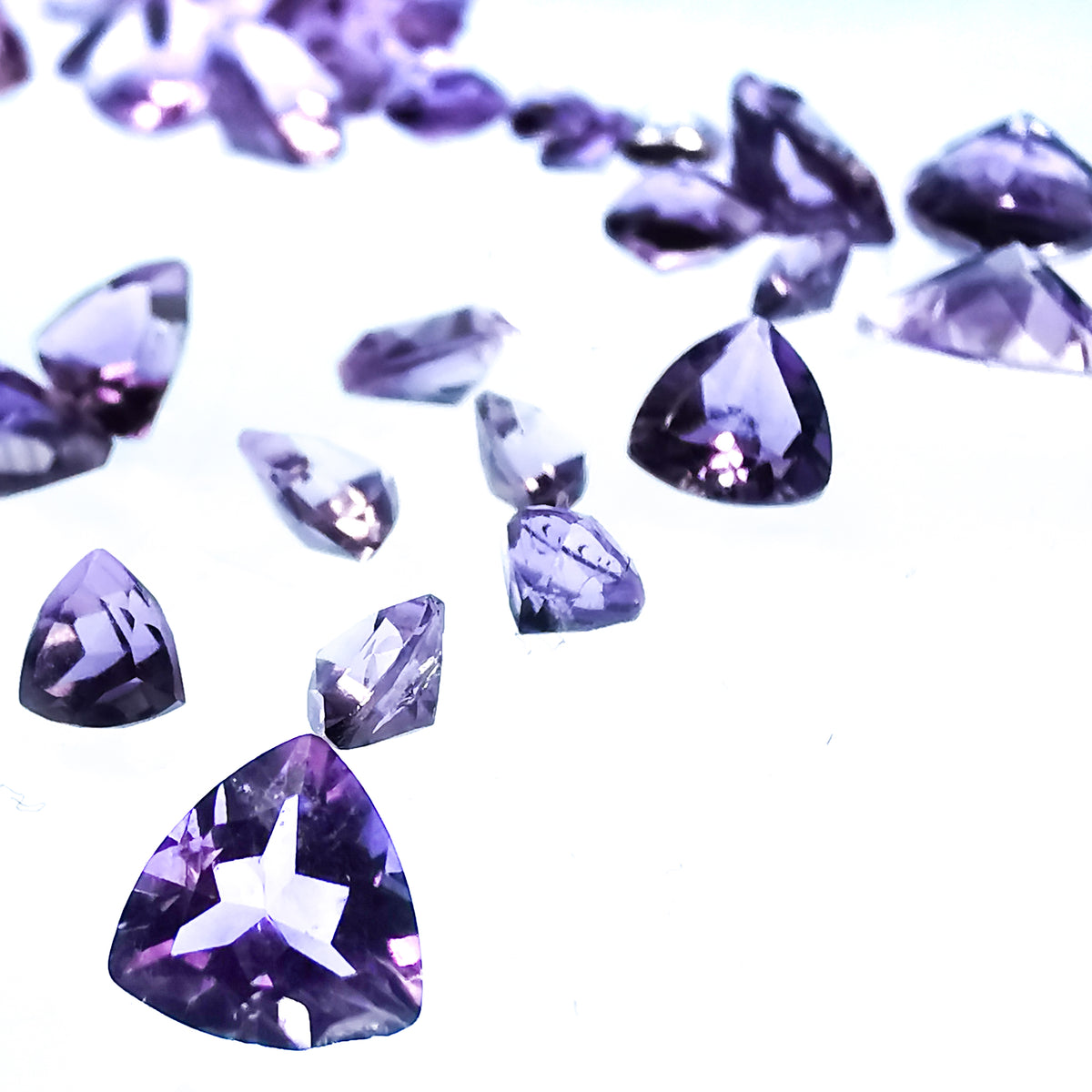 Amethyst trillion facets: scattered trillions