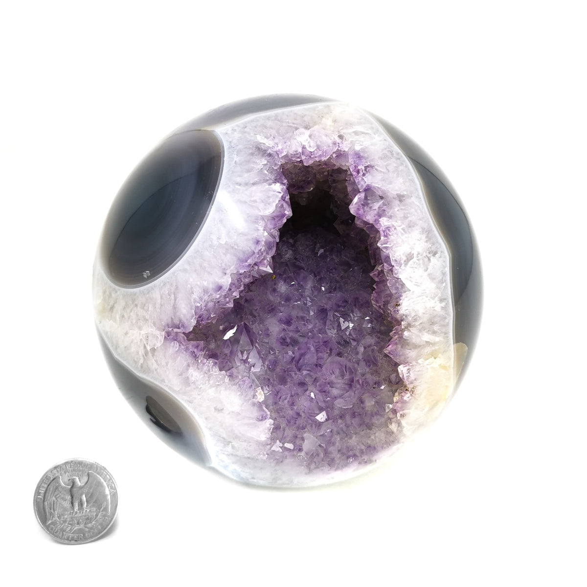 Amethyst Crystal sphere specimen, a variety of quartz, from Brazil.