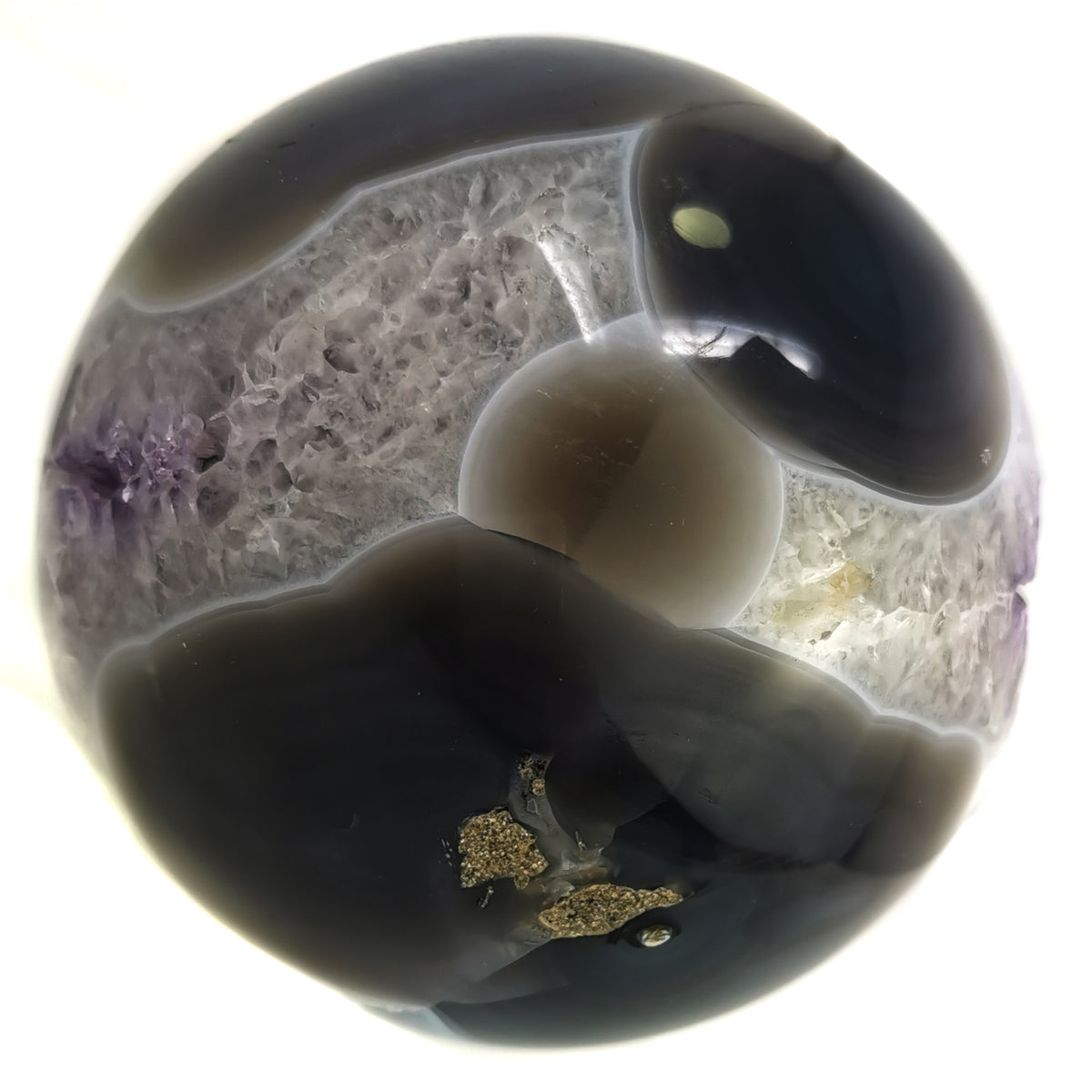 Amethyst Crystal sphere specimen, a variety of quartz, from Brazil.