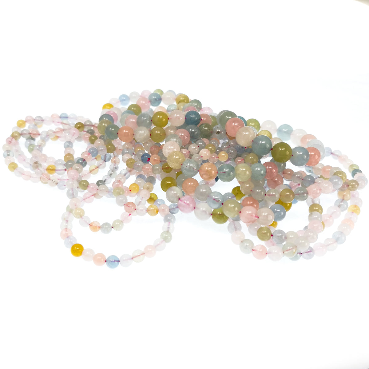 Beryl bead bracelet: pile of bracelets