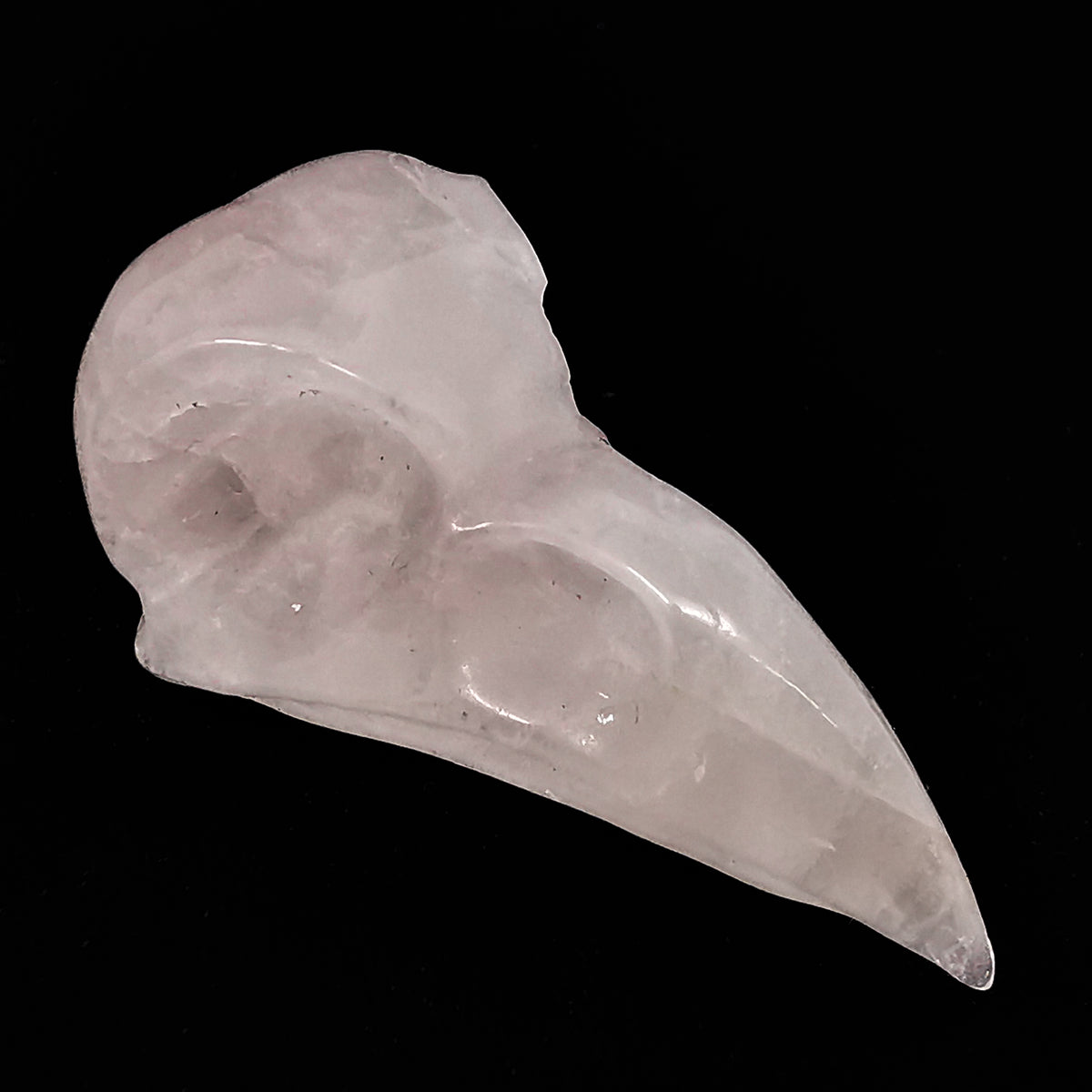 Bird skull carving – pale pink skull