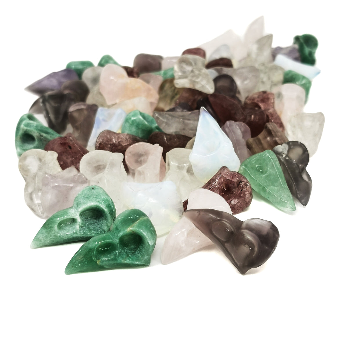 Bird skull carving – pile of assorted skulls