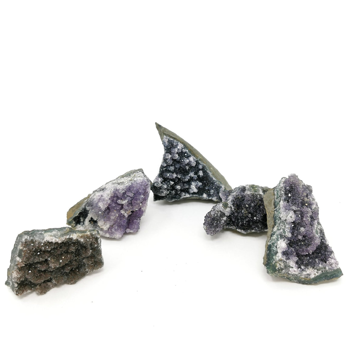 Black amethyst druzy from Uruguay – row of specimens