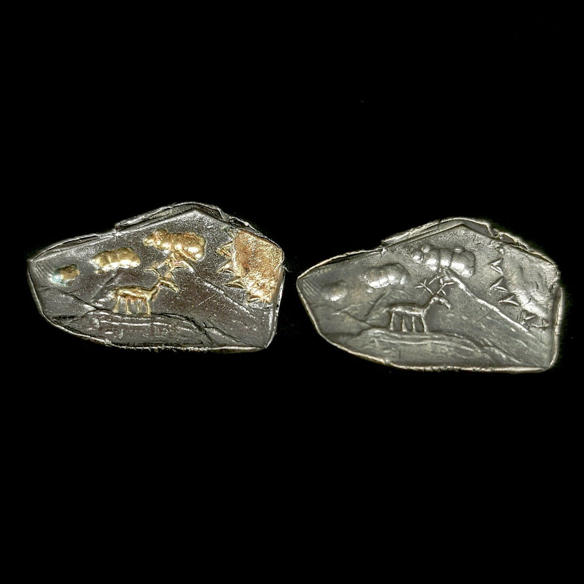 Caribou pendant.
