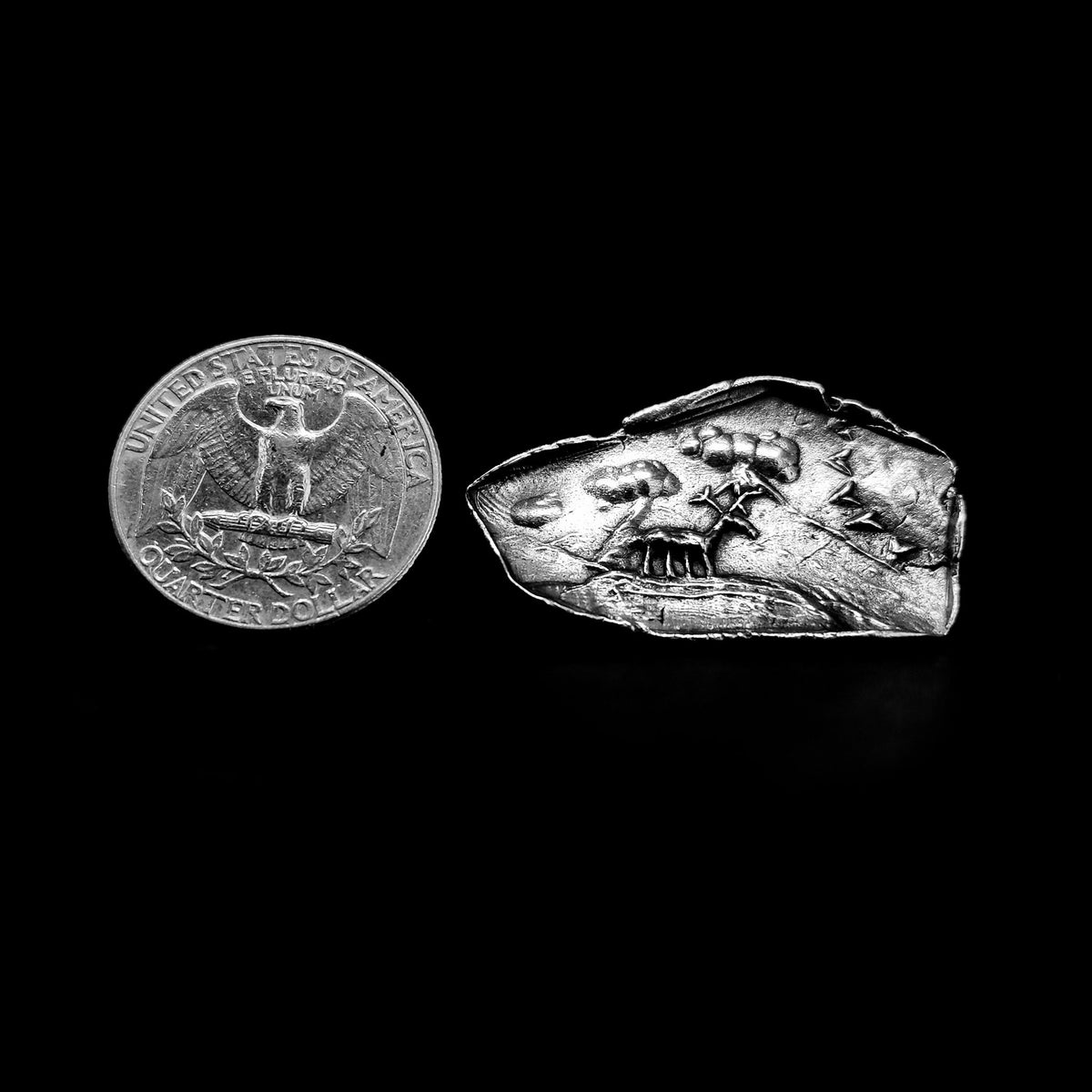Caribou pendant.