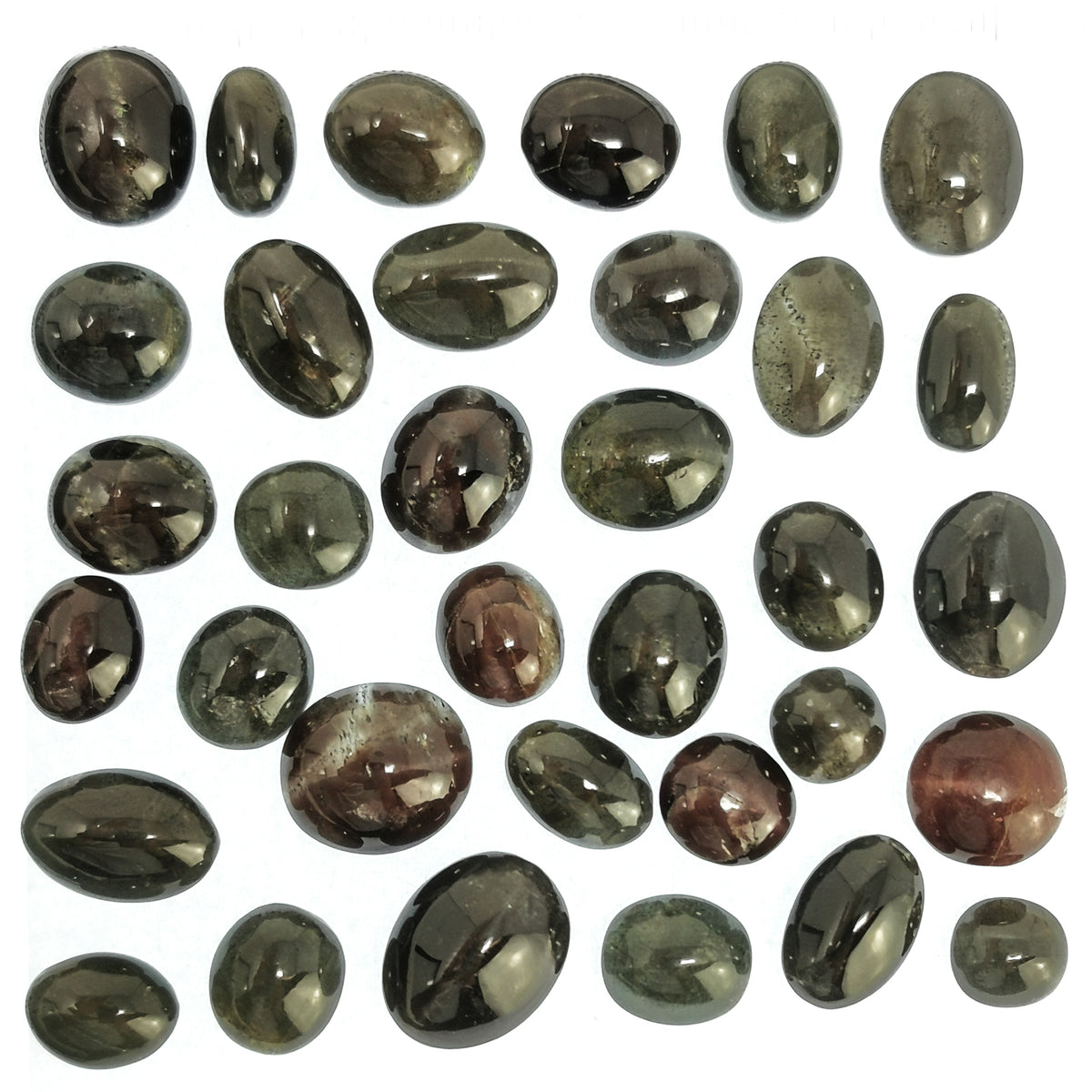 Cats Eye Ruby cabochon, a variety of corundum, from India.