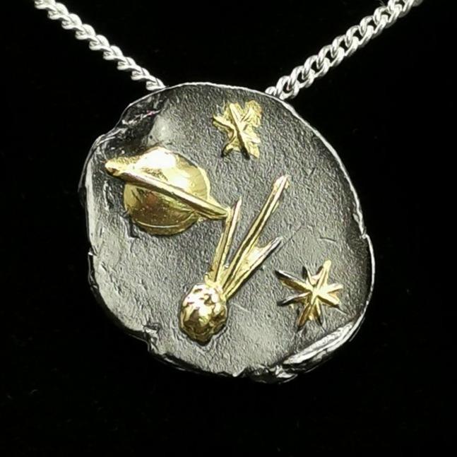 Comet pendant: pendant on chain