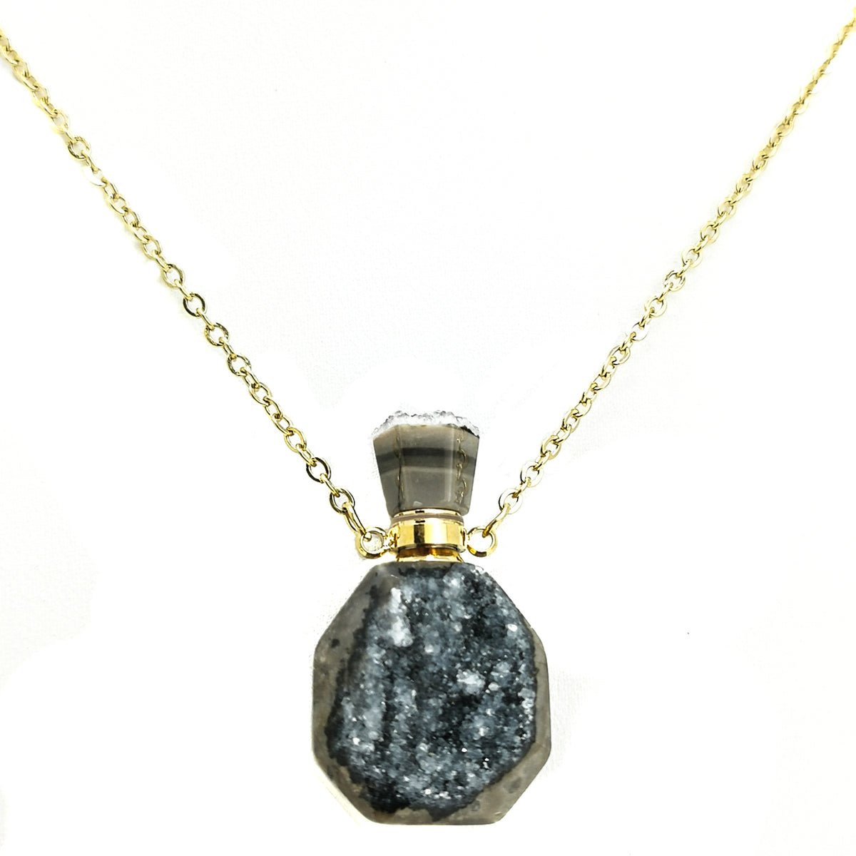 Quartz Druzy perfume bottle pendant in gold- or silver-plated base metal.