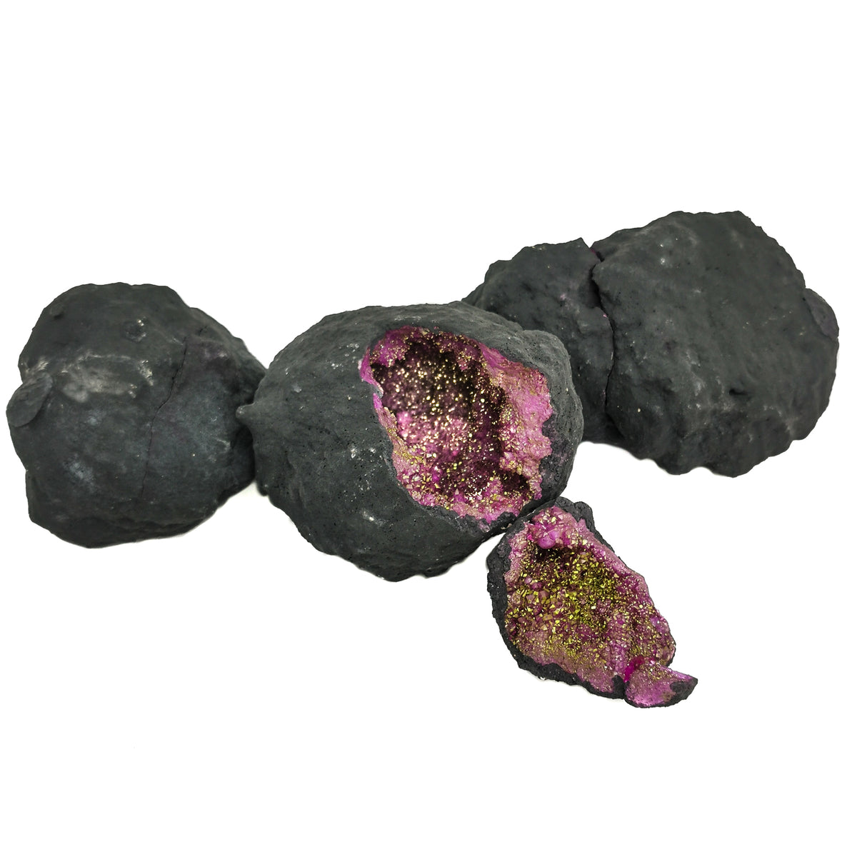 Dyed pink geode pair from Morocco – closed geodes and an open half