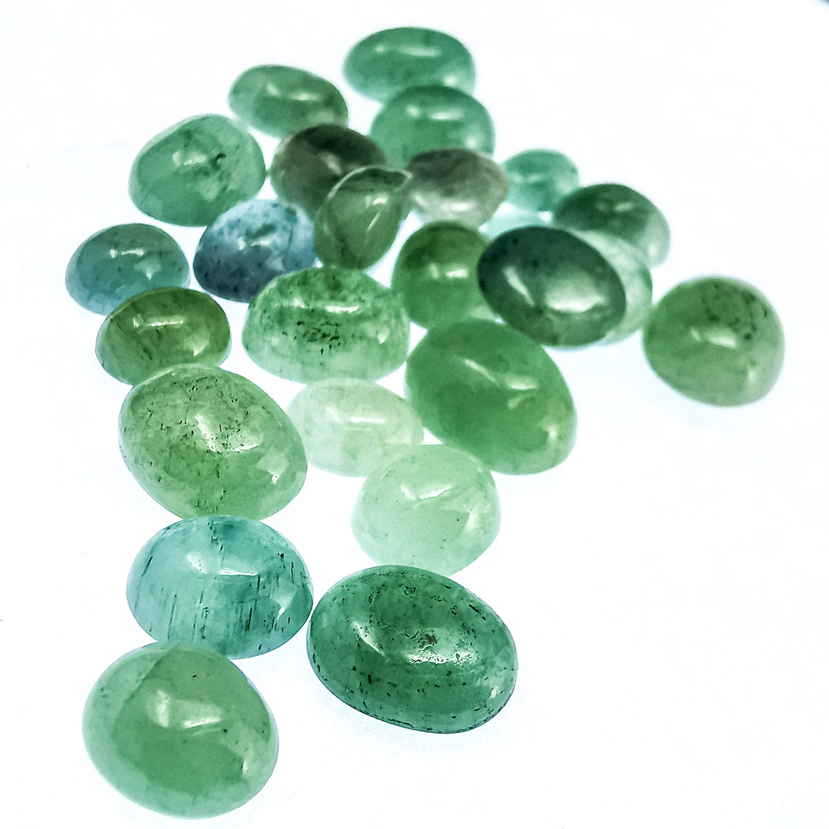 Emerald cabochon, a variety of beryl.