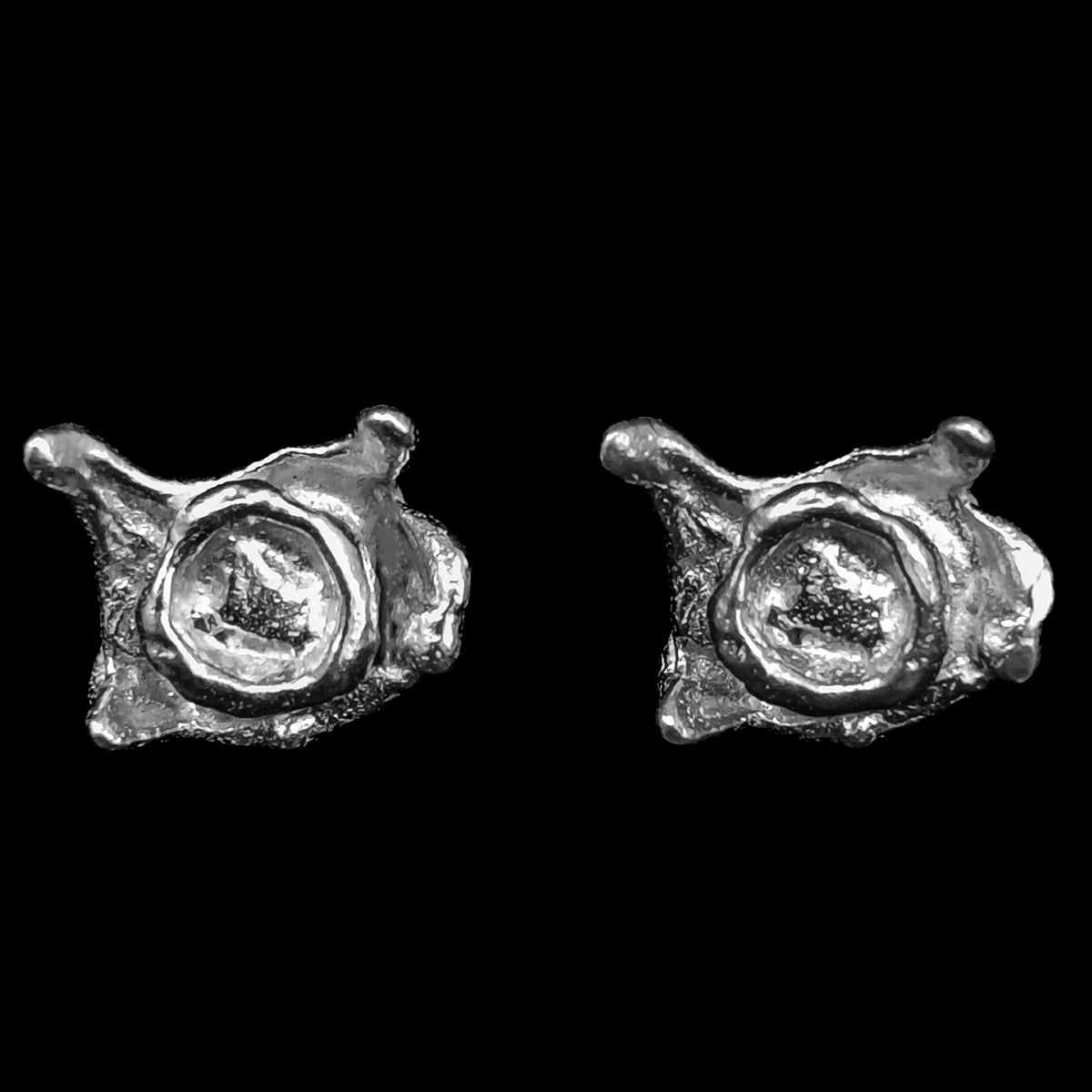 Gob stud earring in sterling silver.