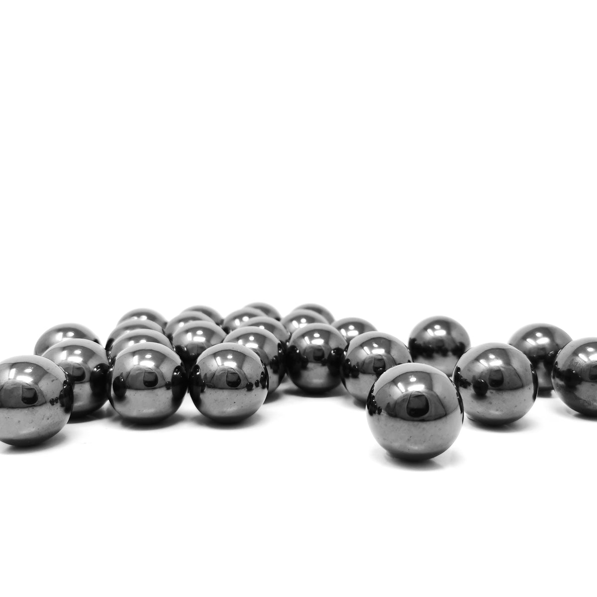 Man-made hematite mini sphere: row of spheres