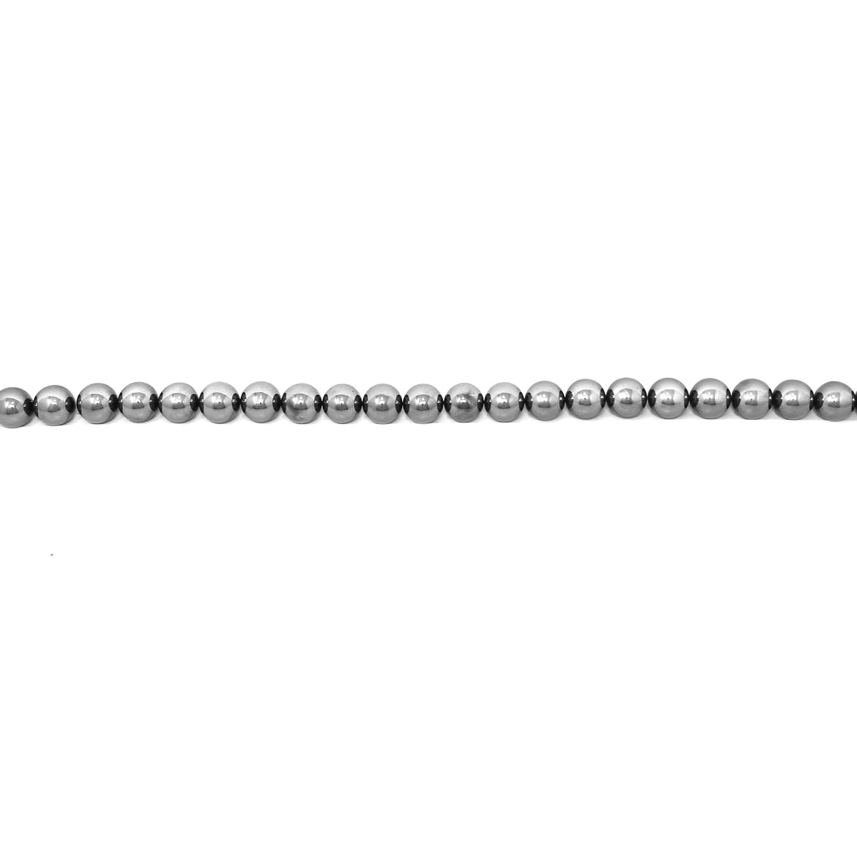 Man-made hematite mini sphere: long row of spheres