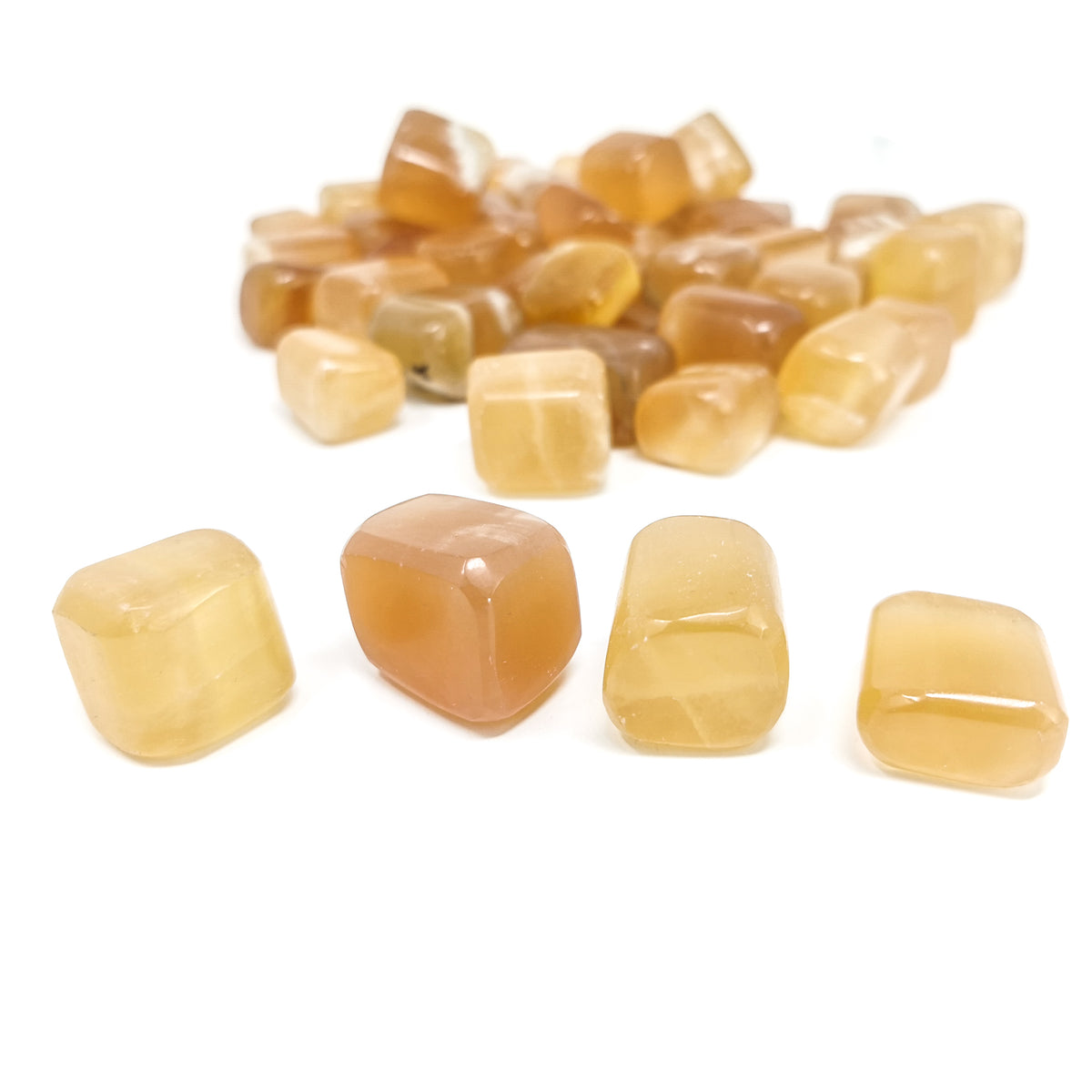 Honey Calcite tumble, calcium carbonate.