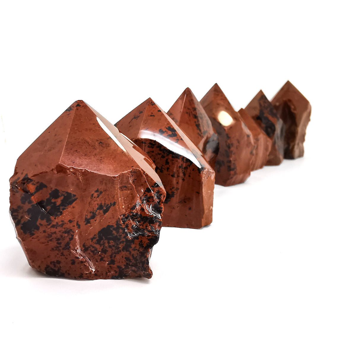 Mahogany Obsidian power point, a volcanic glass, from Mexico.