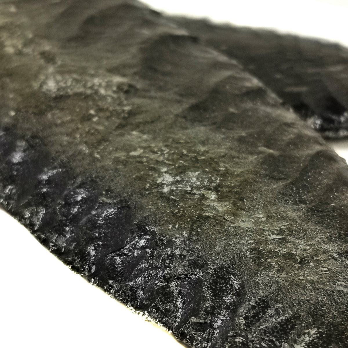 Gold Sheen Obsidian biface, a volcanic glass, from Mexico.