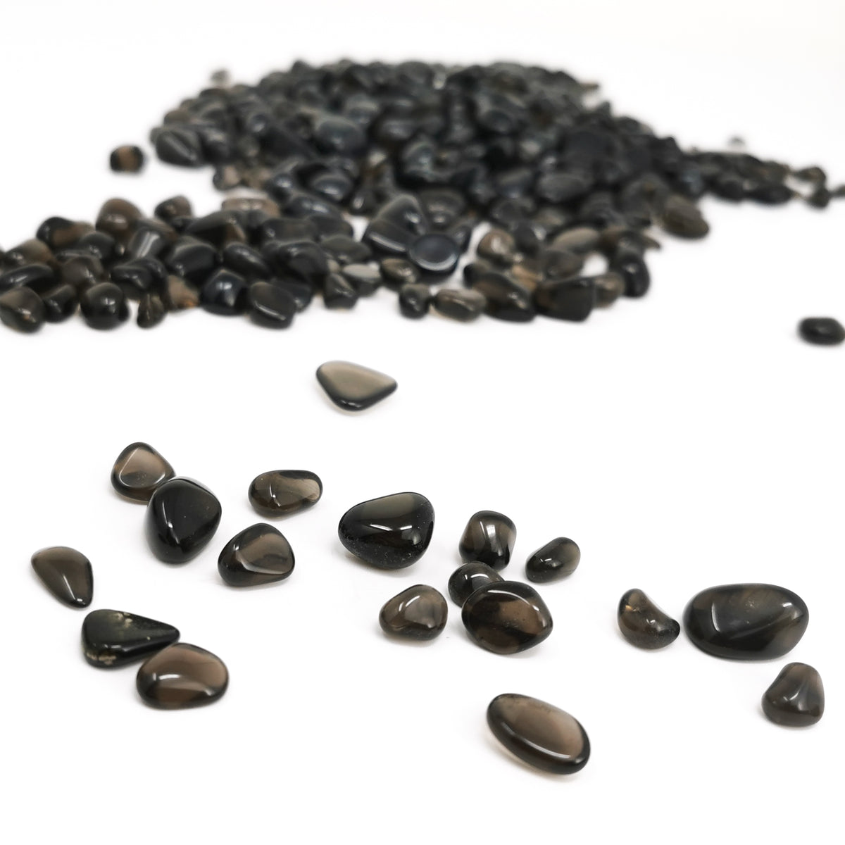 Apache tear obsidian tumble from Arizona – pile and spread