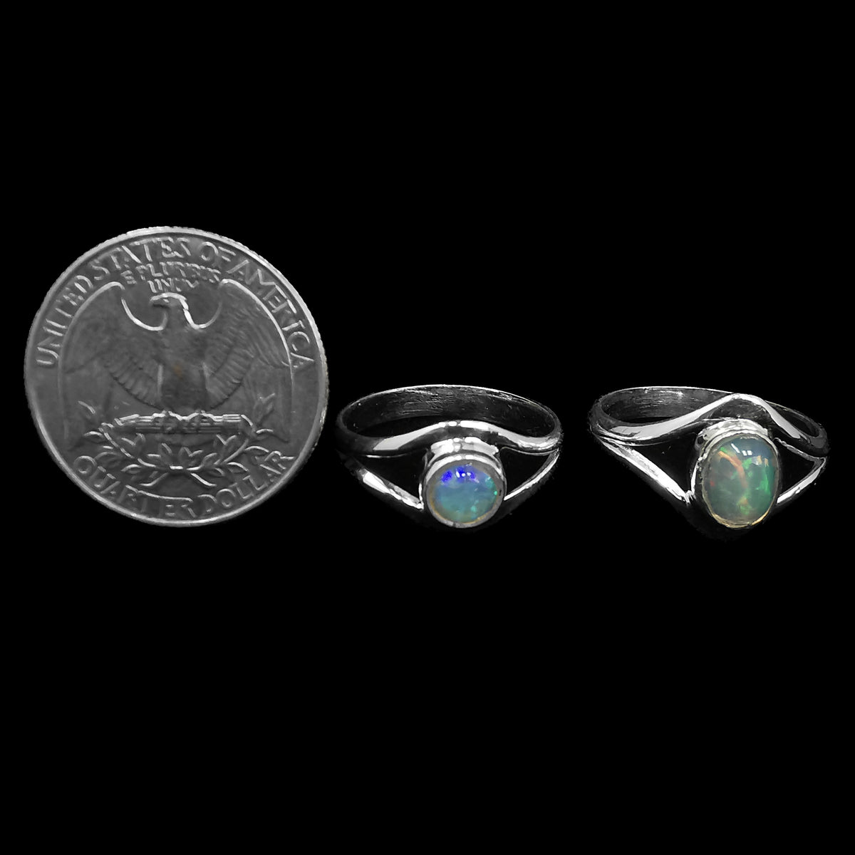 Opal split ring with Ethiopian opal – rings beside a coin