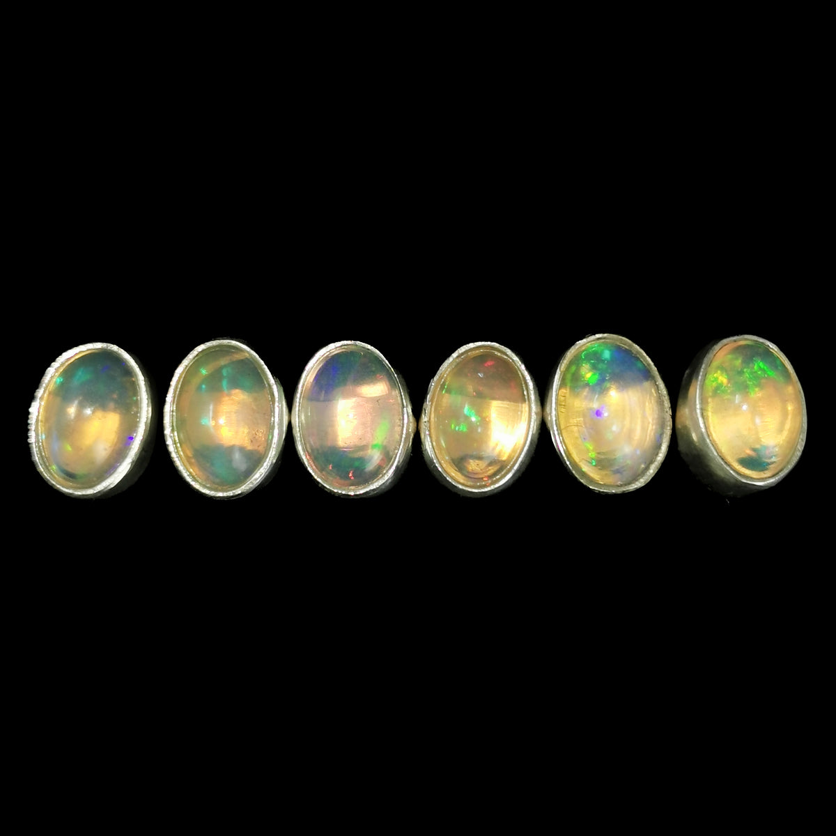 Ethiopian opal oval stud earrings – row of six oval opals