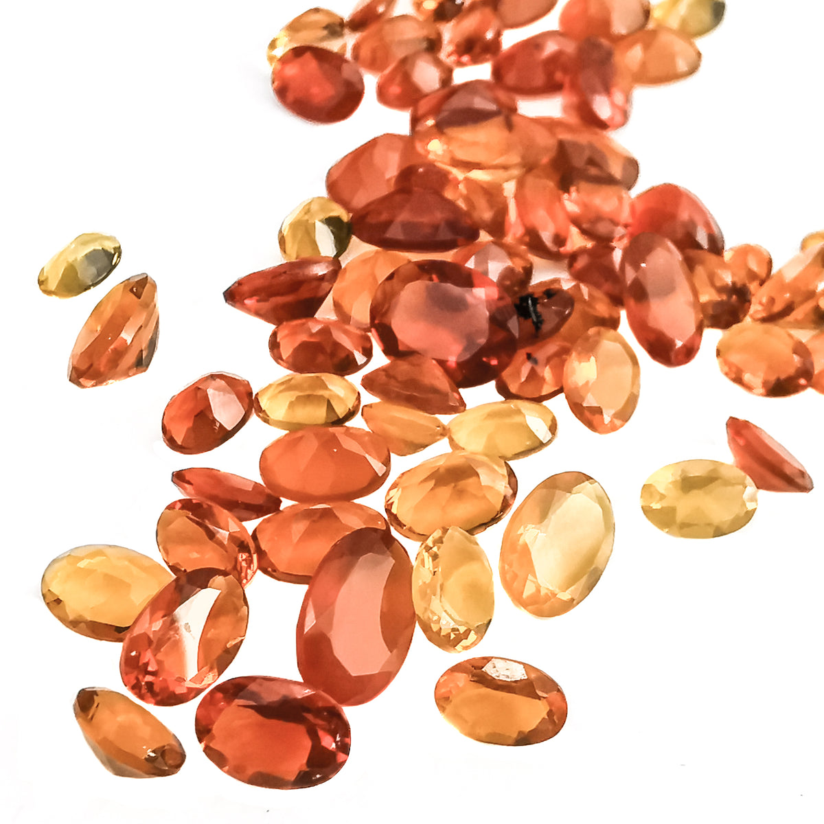 Fire Opal oval facet, hydrated silica, from Juniper Ridge, Oregon, USA.