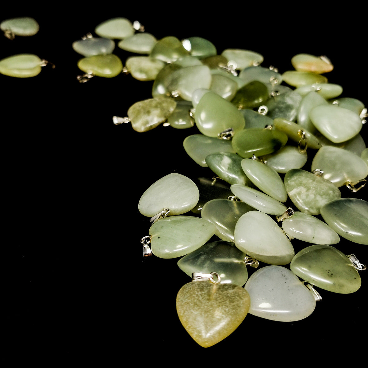 Prehnite Heart pendant in silver-plated steel.