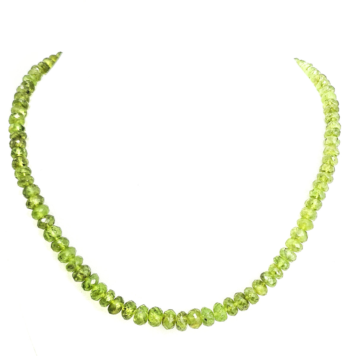 Peridot large facet bead necklace in sterling silver and steel wire.