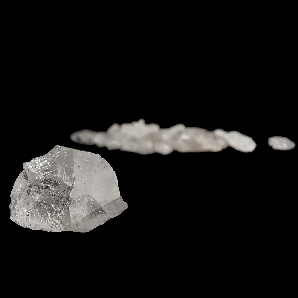Phenakite crystal from Zhytomyr Oblast, Ukraine – large crystal with small ones behind