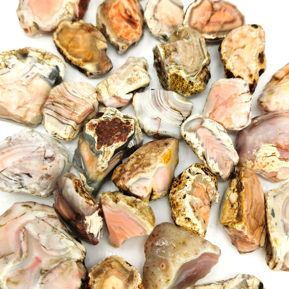 Pink Botswana Agate rough, a variety of chalcedony.
