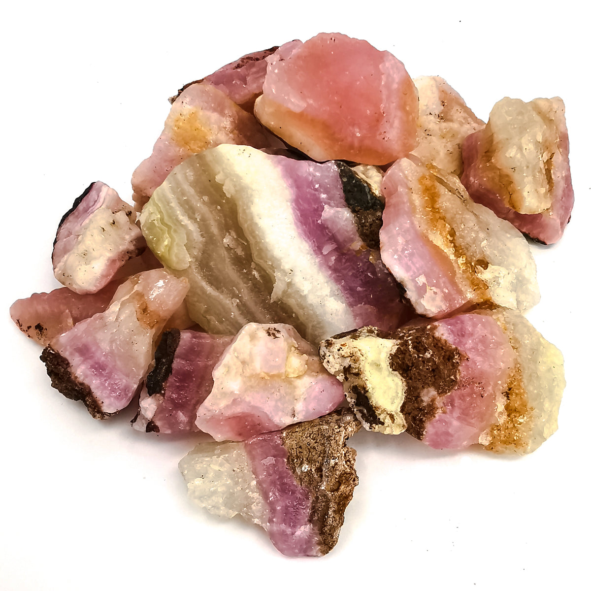 Pink calcite, Pakistan: pile of banded pieces