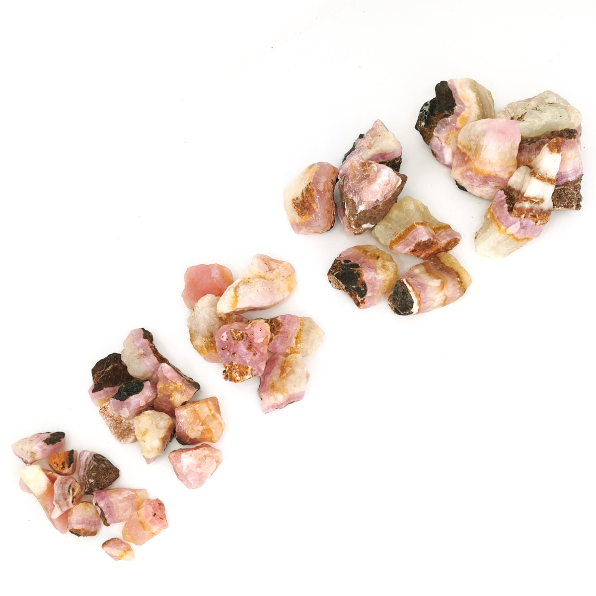 Pink calcite, Pakistan: trail of small pieces