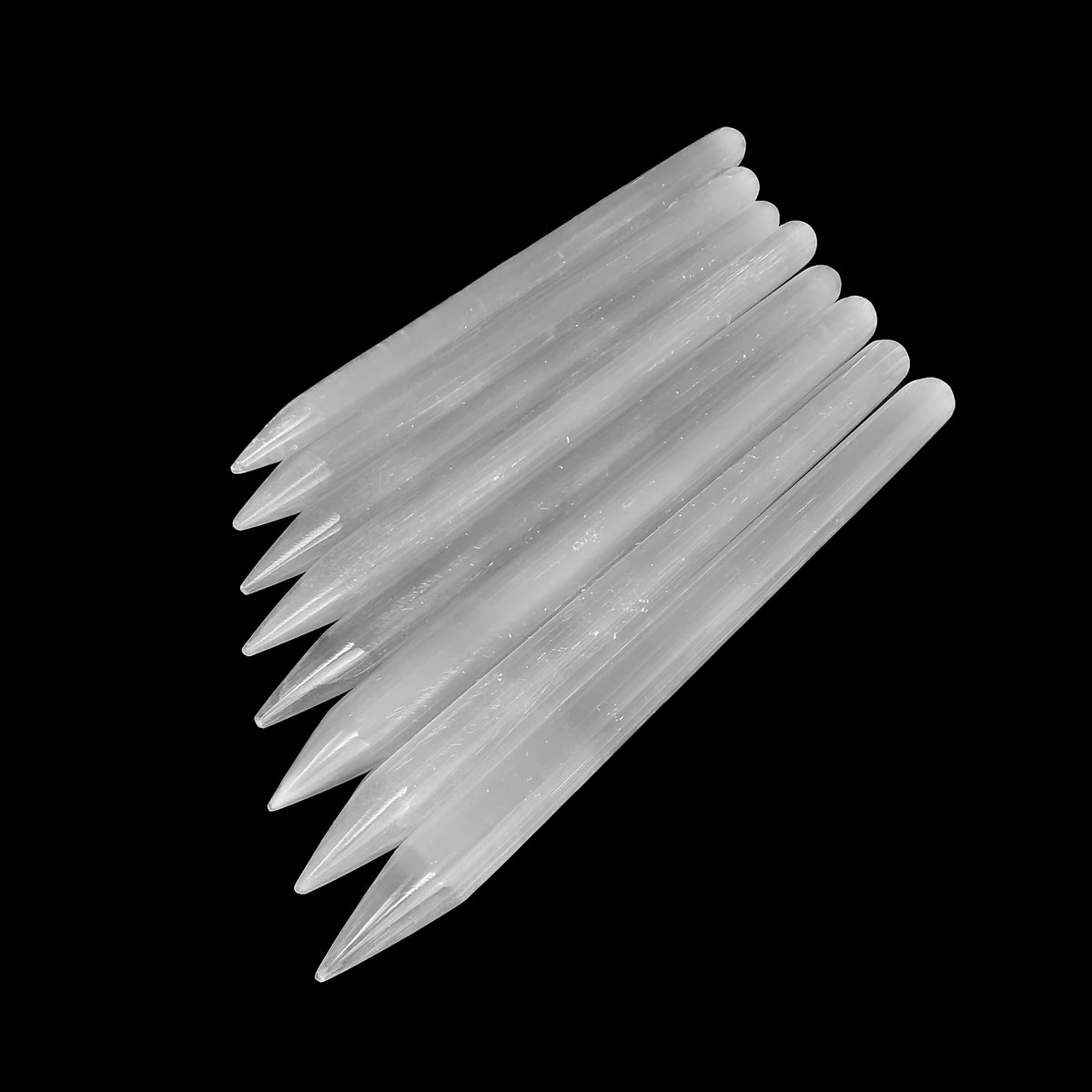 Selenite pencil, Morocco: row of pencils