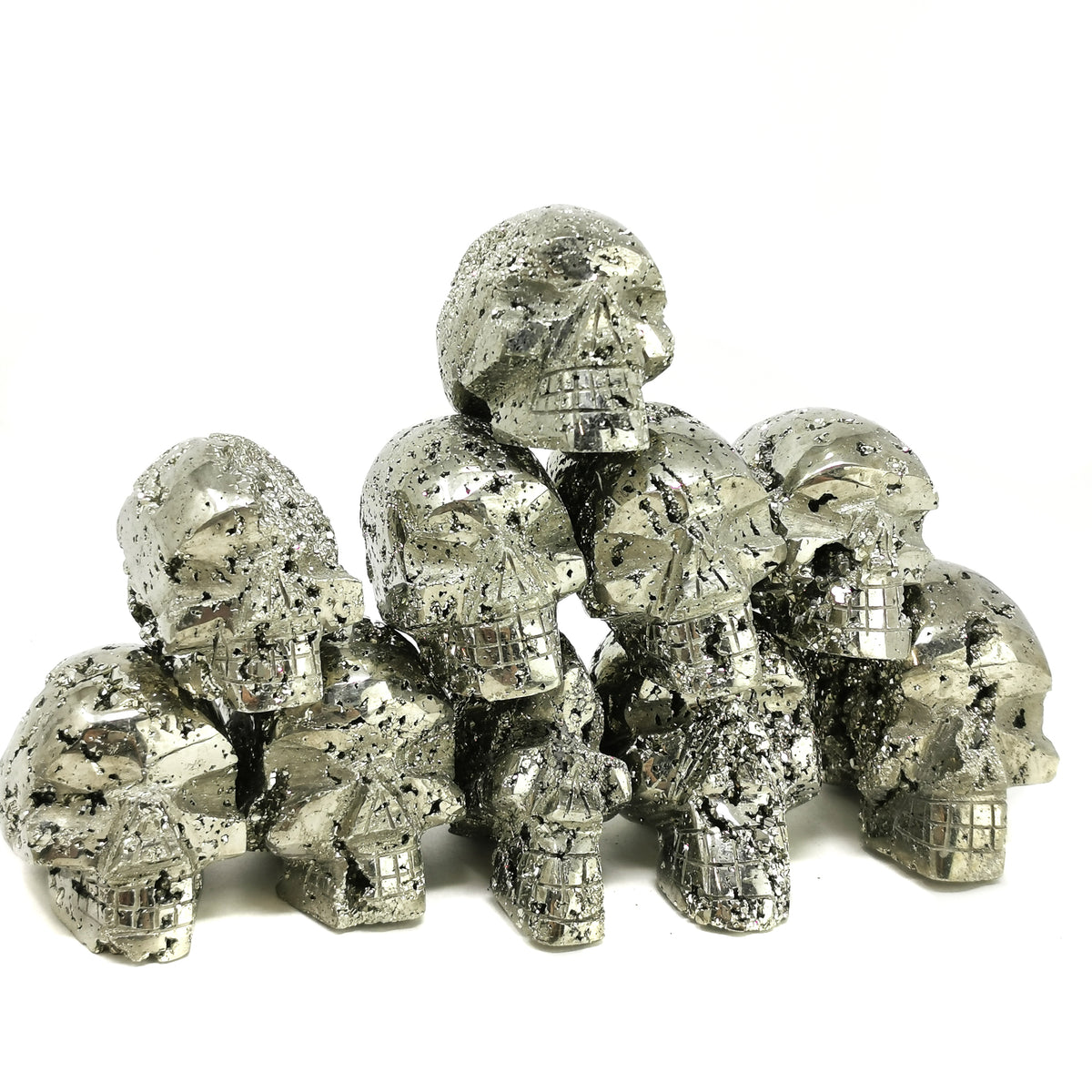 Pyrite skull carving from Peru – group of skulls