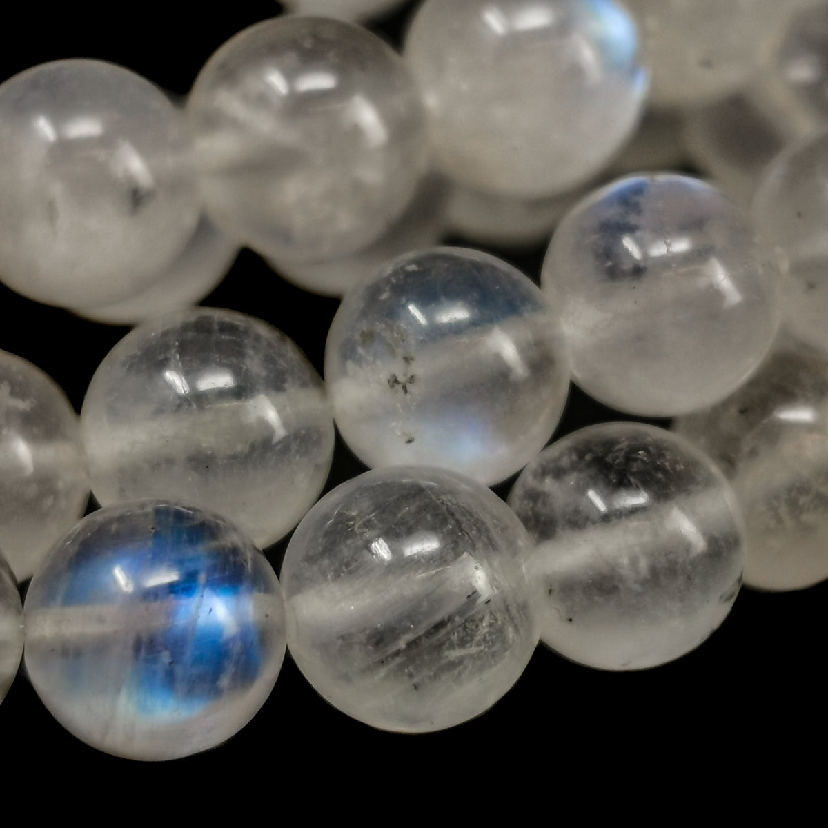 Rainbow moonstone bead bracelet – beads with blue flash, close view